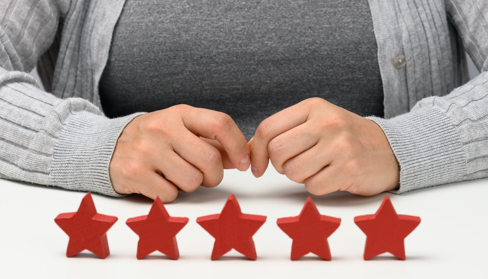 Customer experience feedback concept. Five red stars, the best rating of excellent services